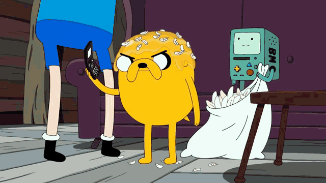 a cartoon character named bmo is talking on a phone