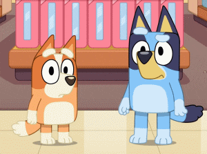 two cartoon dogs are standing next to each other in front of a pink shelf
