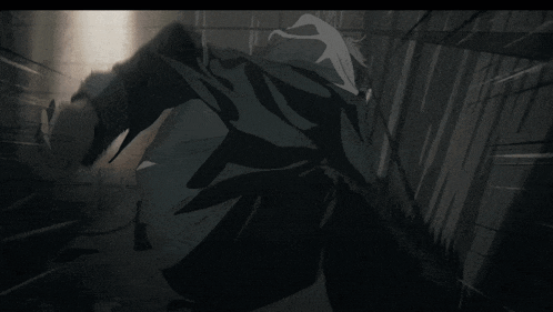 a man in a suit is jumping off a ledge