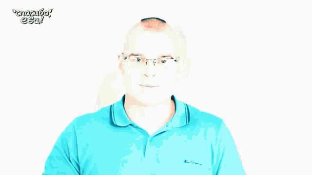 a man wearing glasses and a blue shirt with ben sherman written on the front
