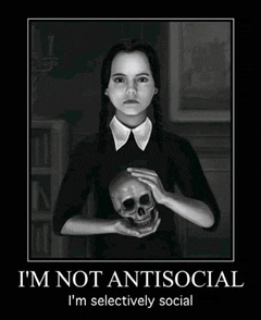 a poster of wednesday addams holding a skull says i 'm not antisocial