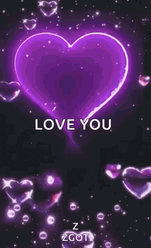 a glowing pink heart with the words `` love you '' written on it .