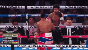 two boxers in a ring with mgm rewards on the ropes