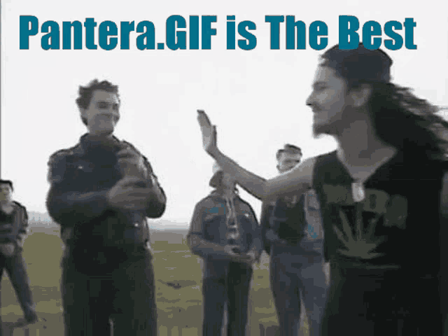 a group of people are standing in a field with the words pantera.gif is the best