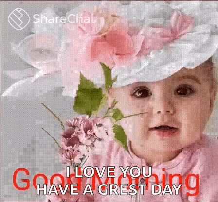 a baby is wearing a hat with flowers on it and says `` i love you have a great day ''