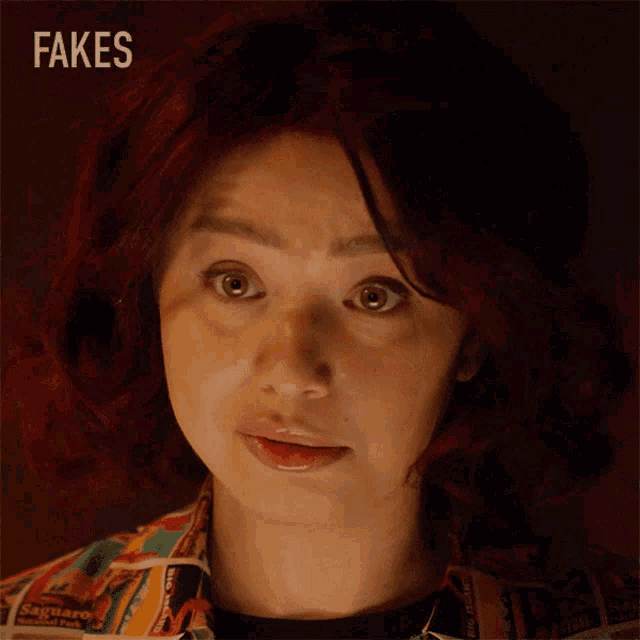 a close up of a woman 's face with the words fakes i am a below her