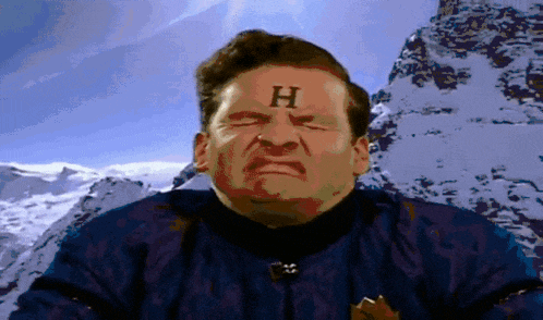 a man with a letter h on his face
