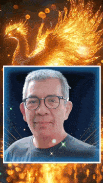 a man with glasses is standing in front of a picture of a phoenix