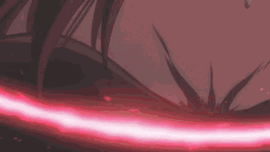 a close up of a person holding a red lightning bolt in their hand .