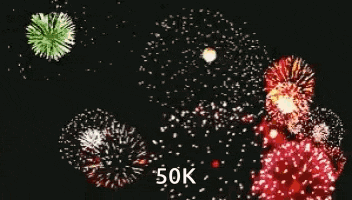 a bunch of fireworks are going off in the night sky