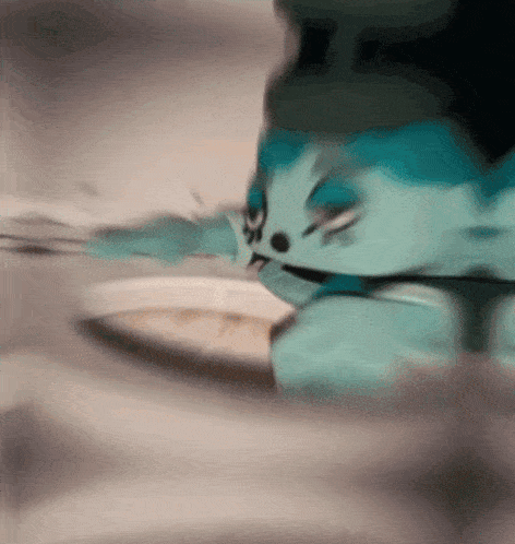 a blurred image of a cartoon character eating a plate of food