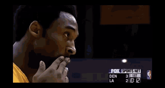 a basketball player with a fox sports net advertisement on the bottom