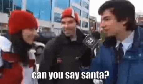 a man and a woman are talking to each other and the man is asking the woman if she can say santa ?