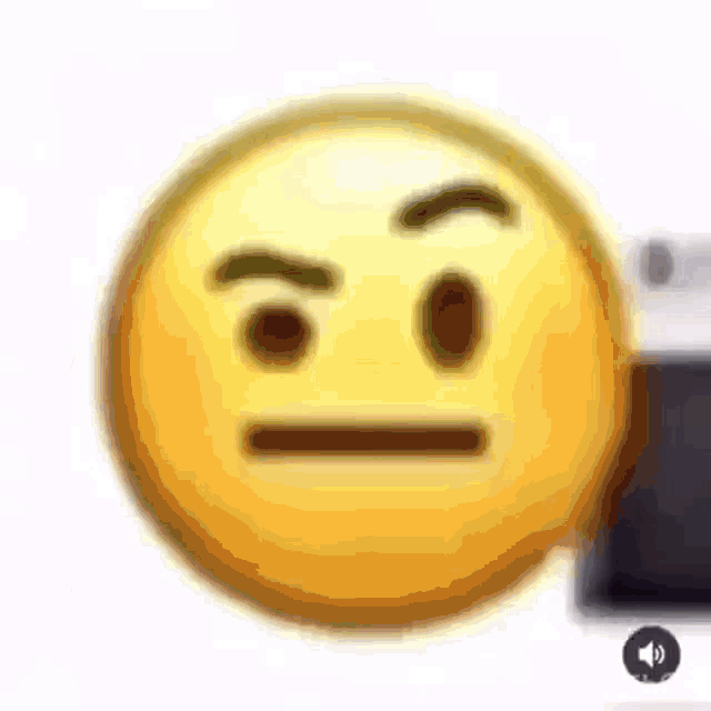 a close up of a smiley face with a slight smirk on it .