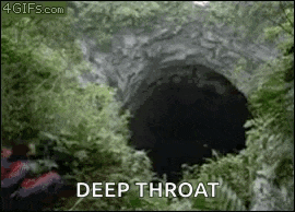 a person is standing in the middle of a cave with the words `` deep throat '' written on it .