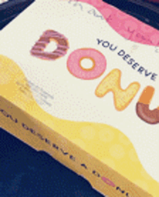 a box that says you deserve a donut