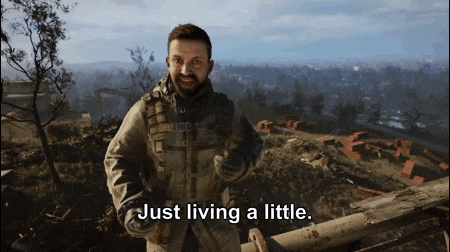 a man in a video game is giving a thumbs up and saying just living a little