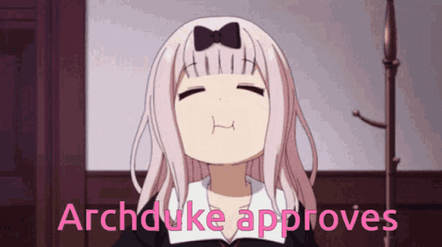 a girl with a bow on her head is making a face with the words archduke approves above her