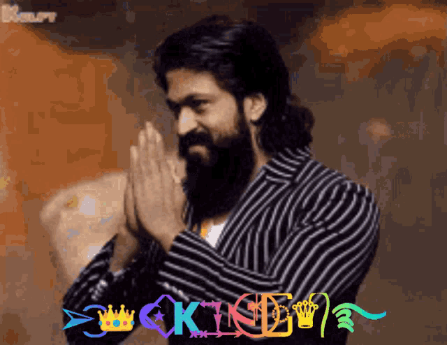 a man with a beard is praying in front of a sign that says ' king '