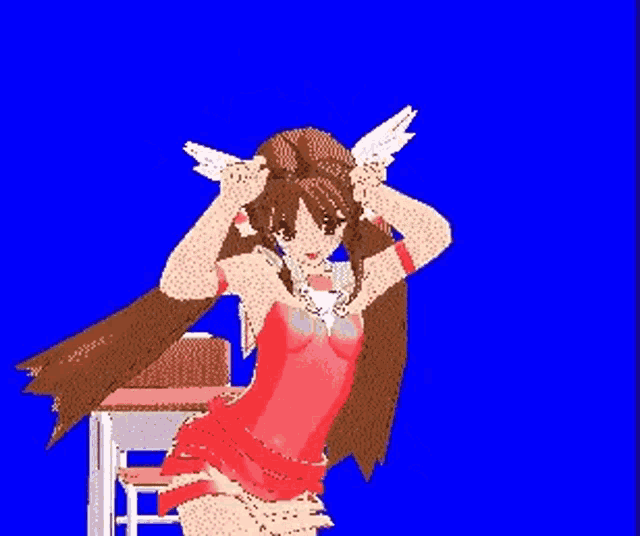a girl in a red dress is sitting on a chair and adjusting her hair