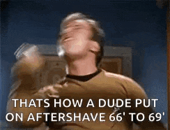 a man is shaving his face with a shaving razor and drinking from a glass .