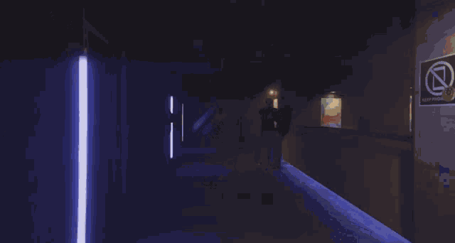 a group of people are walking down a dark hallway with a sign on the wall that says ' coca-cola '