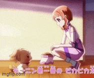 a girl is kneeling down next to a dog with a bowl of food on the floor .