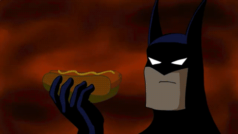 Batman Eating A Hotdog. Hotdog Eating A Batman. GIF - Batman GIFs