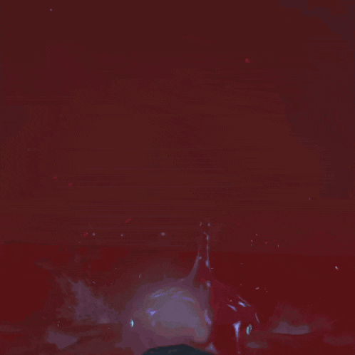 a lightning bolt strikes a purple object in a dark cave