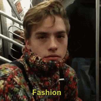a man wearing a scarf around his neck has the word fashion written on the bottom