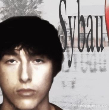 a picture of a young man with sybau written on the bottom right