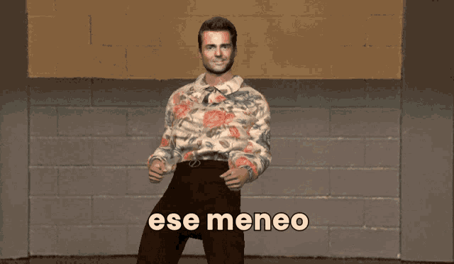 a man in a floral shirt stands in front of a brick wall with the words ese meneo written below him