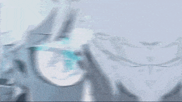 a close up of a person 's eyes with a blue glow