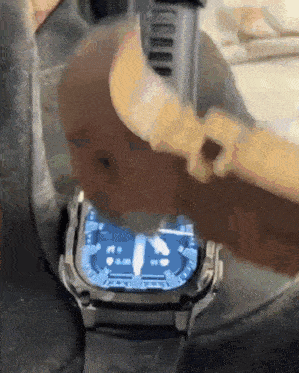 a close up of a person 's wrist with a watch on it that shows the time as 4:20