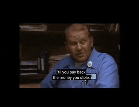 a man in a blue shirt says " i 'll you pay back the money you stole .. "