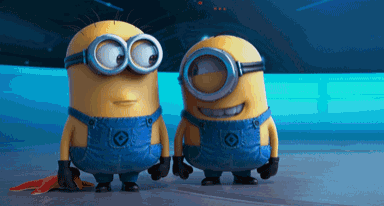 two minions wearing goggles and overalls are standing next to each other on a blue surface
