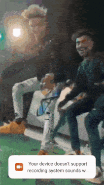 two men are sitting next to each other with a message that says your device does n't support recording system sounds