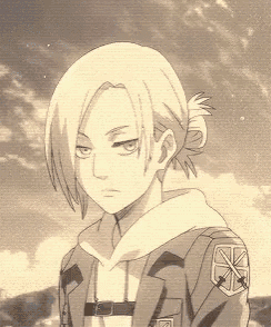 a black and white drawing of a girl with blonde hair and a hooded jacket .