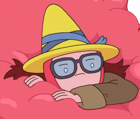 a cartoon character wearing glasses and a yellow hat is laying down