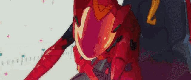 a close up of a red robot with a number 2 on it .