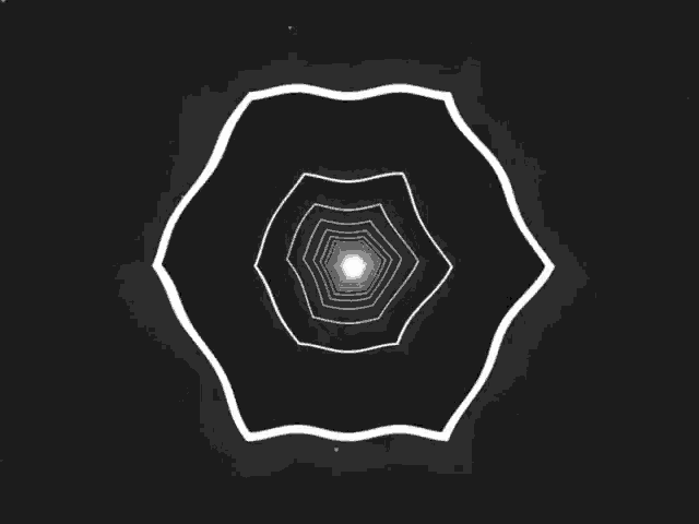 a black and white image of a swirl with a white center
