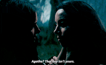 a man and a woman are looking at each other and the woman says " agatha "