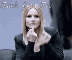 a woman giving the middle finger with the words " fuck you too " below her