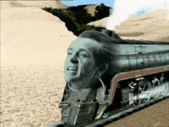 a man 's head is on the front of a train