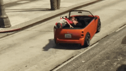 a red convertible car with a license plate that says ' lg ' on it