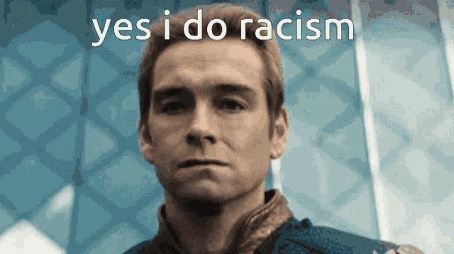 a man with the words yes i do racism written on his face