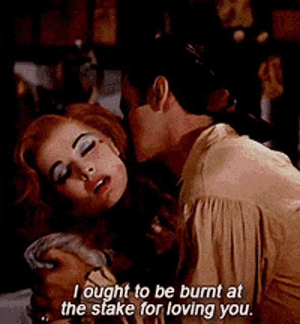 a man kisses a woman on the cheek and says i ought to be burnt at the stake for loving you