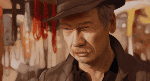 a man with a mustache wearing a hat looks at something