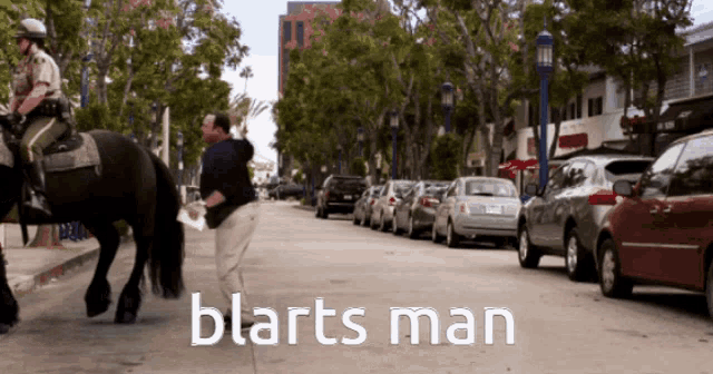 a man standing next to a horse with the word blarts man on the bottom