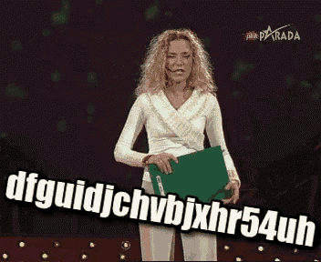 a woman is holding a green folder that says dfguidjchvbjxhr54uh on it